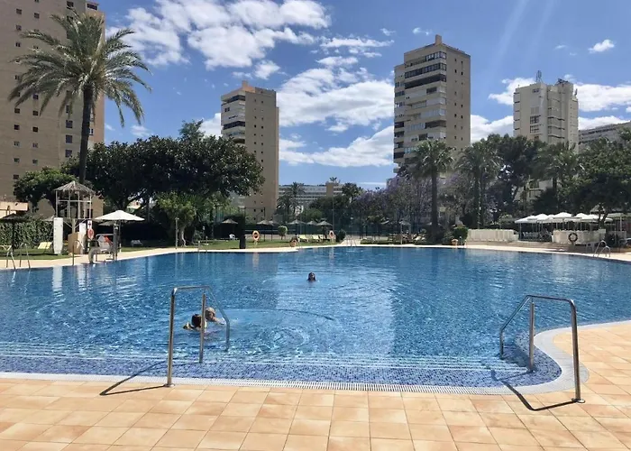 Exclusive Beachfront Apartment Torremolinos - Pool - Paddle - Tenis - Wifi - Central Aircon